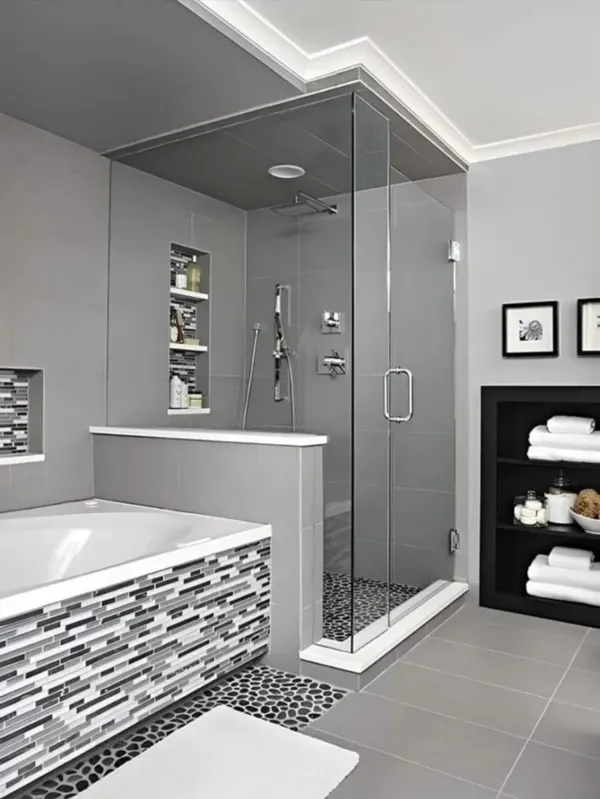 Bathroom with bathtub and glass shower